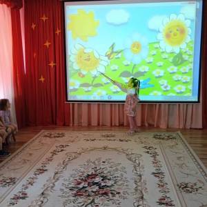 Фотоотчёт о музыкально-игровом занятии в средней группе «Волшебные цветы»